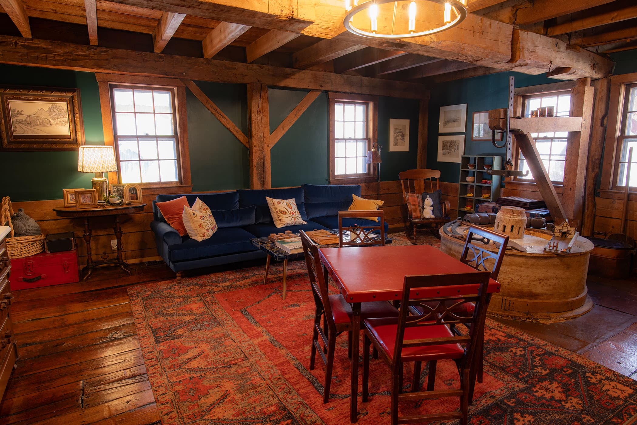 Parlor and old grinding wheel operated by water wheel of mill house