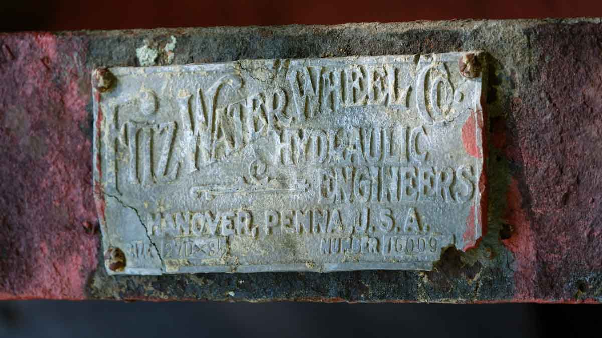 Metal label from Fitz Water Wheel Co., Hydraulic Engineers, Hanover, Pennsylvania, U.S.A.